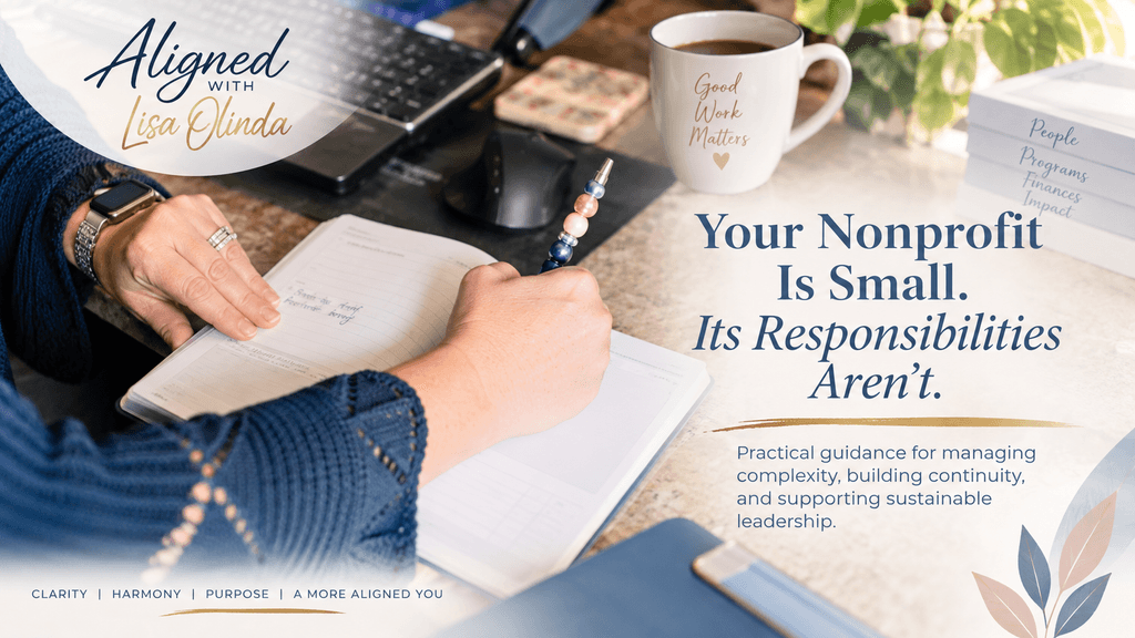 Aligned: Lisa Olinda at desk. Your Nonprofit is Small. It's Responsibilities Aren't. Practical guidance for managing complexity, building continuity, and supporting sustainable leadership.